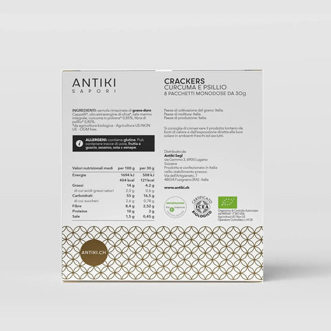 Confezione bianca di crackers Antiki Saporì con curcuma e psillio, 8 monodosi, dettagli nutrizionali e certificazioni bio.